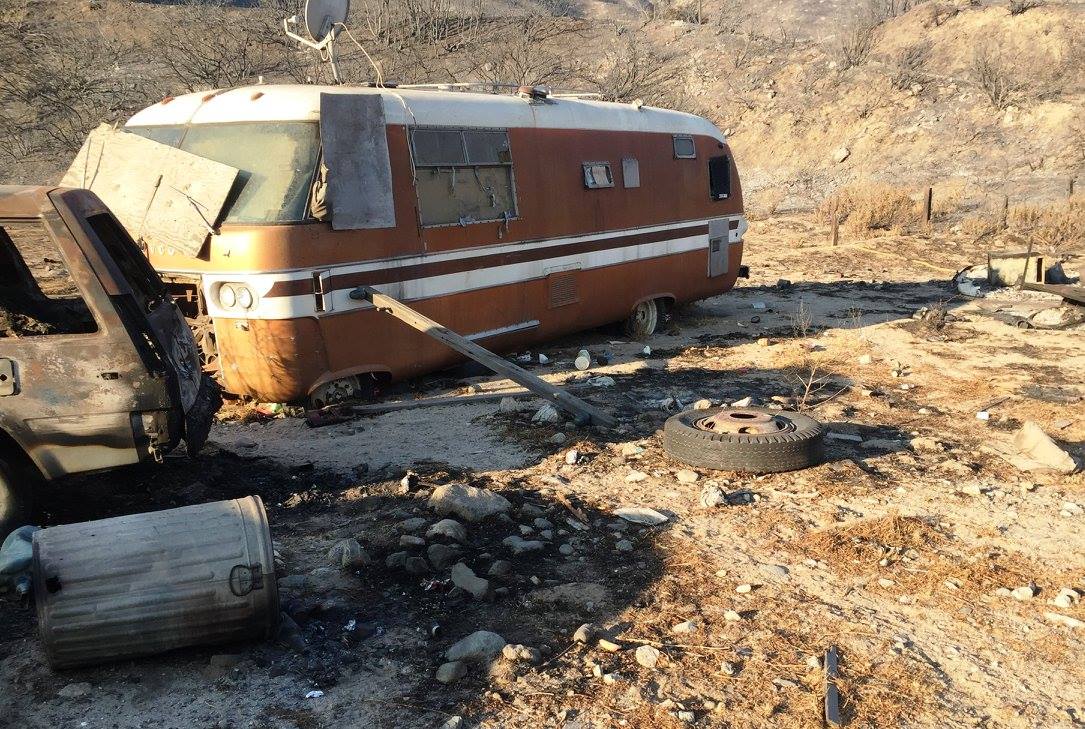 Burned truck where dog was hiding