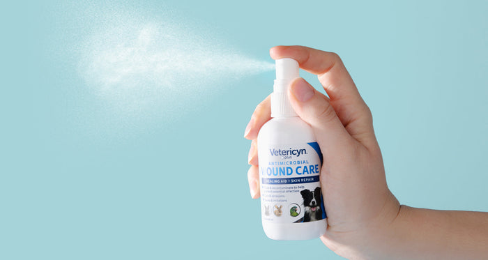 hand spraying vetericyn wound care